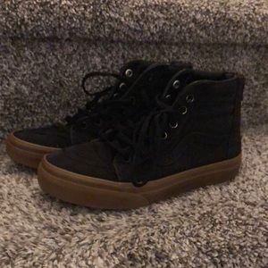 Vans kids size 3 black high top shoe. Brown gum sole. Good used condition.